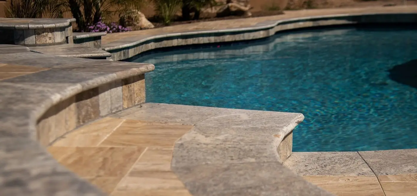 Classic Travertine pool coping and outdoor paving